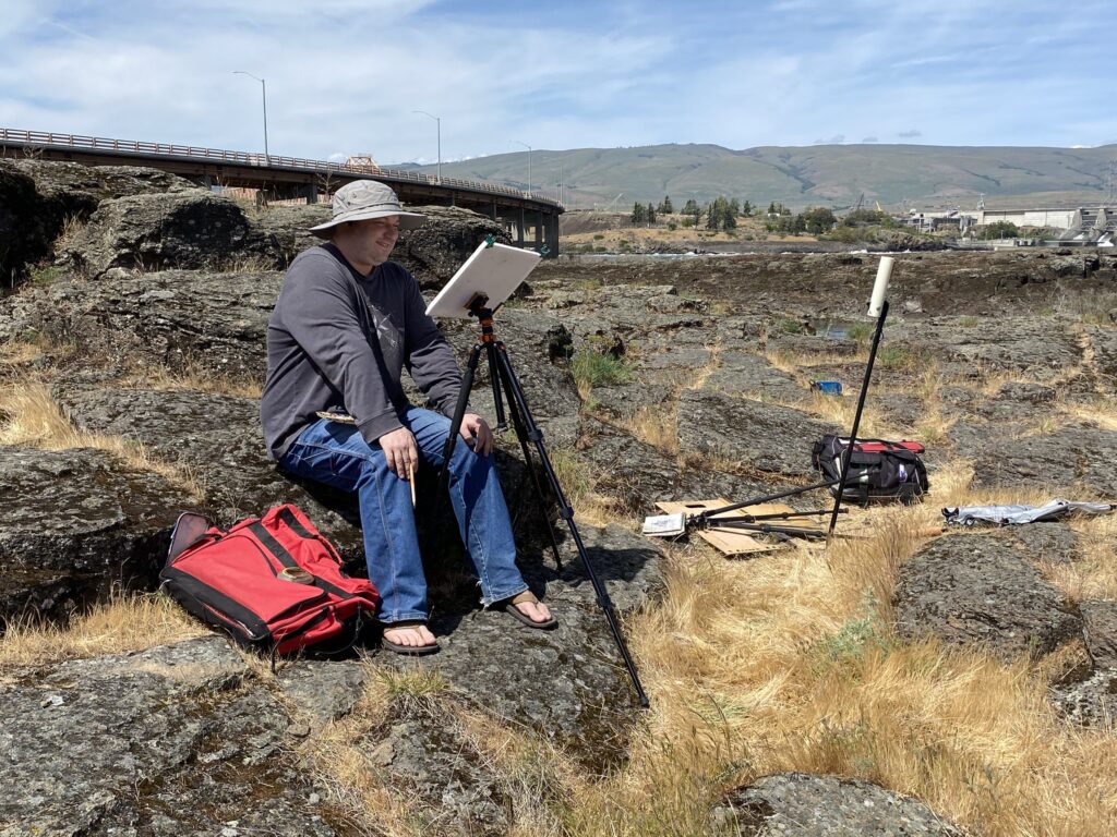 A watercolor painting of a watercolor artist at his easel